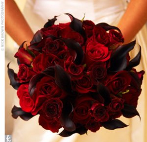 Dark red calla and red roses.jpg