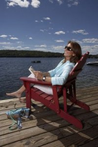 Dorina on dock reading.jpg