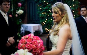 Ceremony 89 - Handing off the bouquet.JPG