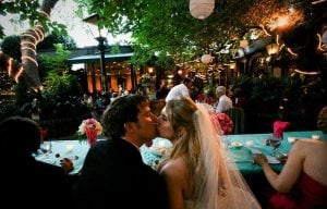 Reception 54 - Head table kissy.JPG