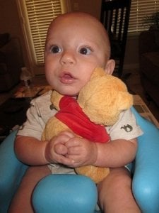 10.12.10 C with his pooh bear.jpg