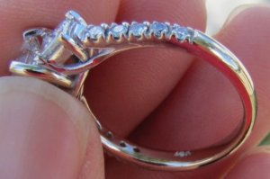 3 stone princess diamond ring side.jpg