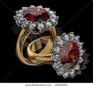 stock-photo-garnet-and-diamond-cluster-rings-on-black-24252205.jpg