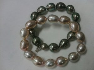 2 metallic FW Tah bracelets.jpg