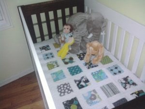 b quilt in crib.jpg