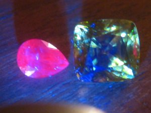 sapphire_purple_next_to_sphene1.jpg