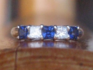 2010_s_square_diamond_and_sapphire_5-stone_band.jpg