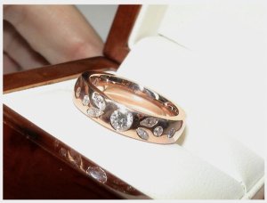 rose_gold_bezel_set_wedding_ring_a.jpg