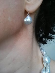 poj_dove_metallic_keshi_ear_shot_1.jpg