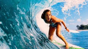 womansurfingbigwave.jpg