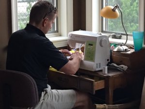 gregworkingoncanopyatsewingmachine.JPG