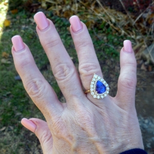 tanzanite_diamond_pear_ring_on_hand.jpg