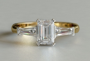 diamond-engagement-ring-emerald-cut-baguette-3-stone-yellow-gold-large.jpg