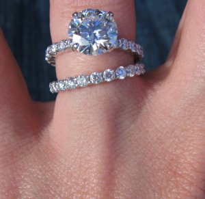 Diamond ring with shared pront setting.jpg