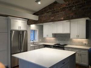 beachhousekitchenbacksplashandbrickbeamandcountersandcabinets.jpg