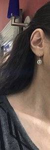 dangleearringsonear.jpg