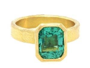 trabert-goldsmiths-293cts-columbian-emerald-bezel.jpg