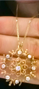 antiqueyellowgoldanddiamondpendant.png