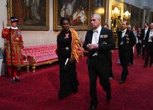 dame-vivien-hunt-and-the-prince-andrew-duke-of-york-arrive-news-photo-1147874795-1559598718.jpg