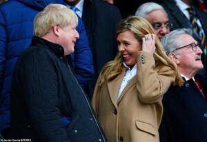 25738320-8091975-Prime_Minister_Boris_Johnson_and_his_fianc_e_Carrie_Symonds_at_t-m-146_158376...jpg