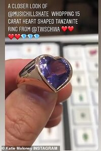 27237402-8223179-Closer_look_The_15_carat_heart_shaped_tanzanite_ring_was_designe-a-30_1586980...jpg