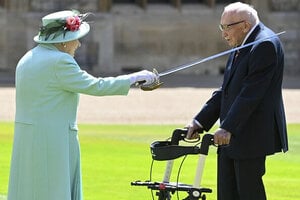 conferred the Honour of Knighthood on Captain Tom Moore at an Investiture at Windsor Castle in...jpg