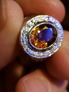 holding topaz ring.jpg