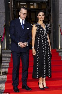 33314048-8743643-Crown_Princess_Victoria_of_Sweden_43_and_Prince_Daniel_47_appear-a-147_160036...jpg