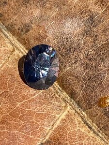 Grey Oval Spinel Outside Strong Sunlight 1.jpg