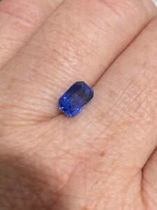 1.62 carat sapphire inside strong overhead lighting 1.jpg