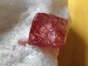 Pinkish-red spinels in marble Mogok 2.JPG