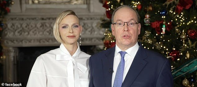 37621682-9113931-Prince_Albert_II_of_Monaco_62_stood_side_by_side_with_Princess_C-a-7_16098464...jpg