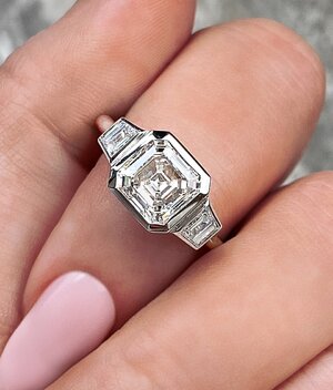 inspo for asscher tourmaline three stone.jpg