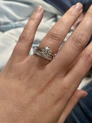 Spacer ring?? Okay so I saw that my wedding band was starting to damage my  engagement ring prongs. The ering is low set, so I got a 1mm spacer band  for it.