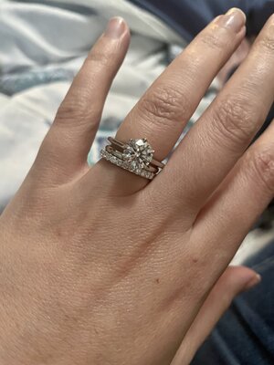 Spacer ring?? Okay so I saw that my wedding band was starting to damage my  engagement ring prongs. The ering is low set, so I got a 1mm spacer band  for it.