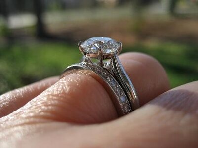 Cathedral basket setting hot sale engagement ring