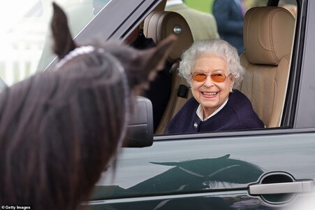 57774193-10812857-Her_Majesty_arrives_at_The_Royal_Windsor_Horse_Show_at_Home_Park-a-1_1652463...jpg