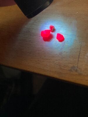 Tanzanian rubies fluorescing.jpg