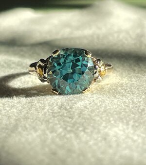 IMG_7846_ANTIQUE_BLUEZIRCON_FLOWER_RING_5.37CTW.jpeg