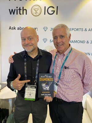 John Pollard and Garry presenting book.jpg