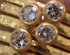 CustomBezelSetDiamondGurhanRings.jpg