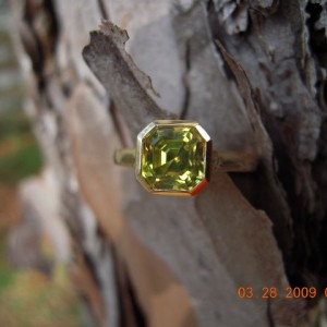 Chrysoberyl in a WF green gold bezel setting