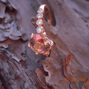 Peach toumaline in rose gold setting