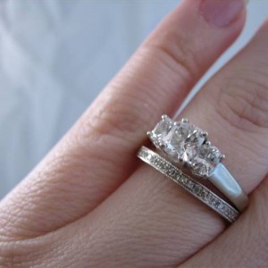 LaurenThePartier's sister's e-ring with 3 sided pave band