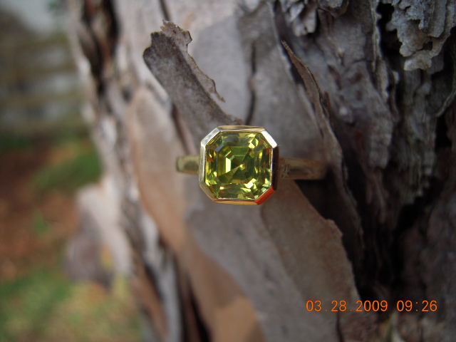 Chrysoberyl in a WF green gold bezel setting