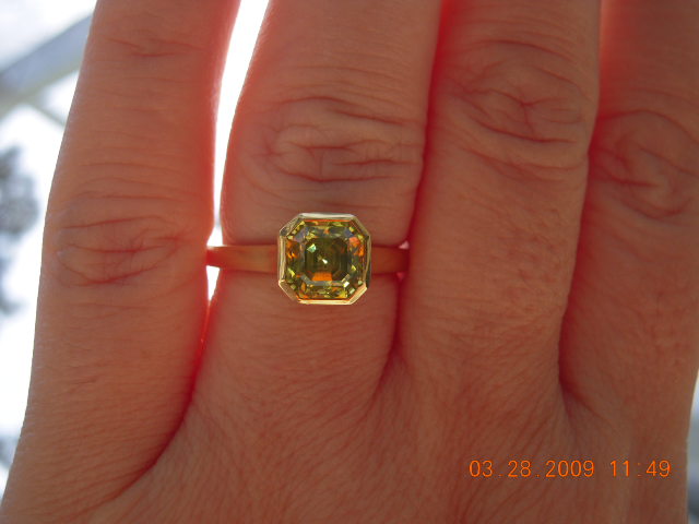 Chrysoberyl in green gold.