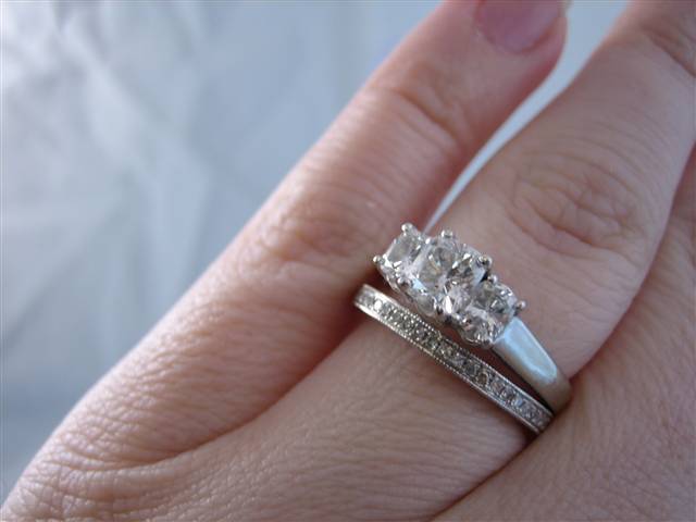 LaurenThePartier's sister's e-ring with 3 sided pave band