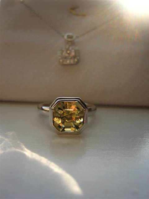 LTP's .46 ct. OEC pendant with bezel set .20 ct. OMC