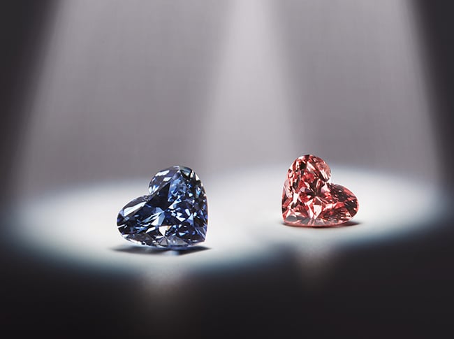 The 0.71 Argyle Celestial blue diamond with a twin pink diamond