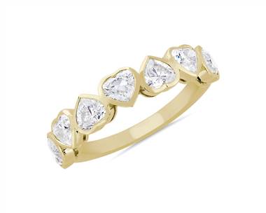 White gold diamond ring with 3 heart-cut diamonds